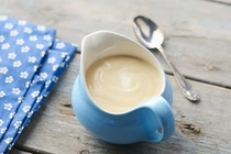 Vanilla Flavour Custard in a pouring jar