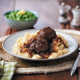 Traditional British pork faggots and mash in gravy ready meal for home delivery