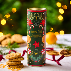 A tube of Orage & cranberry biscuits decorated with candy canes