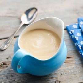 Vanilla Flavour Custard in a pouring jar