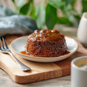 A sponge pudding topped with sticky toffee sauce