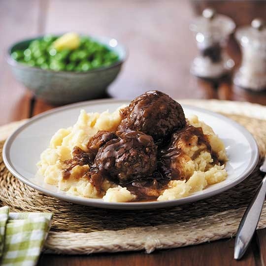 Traditional British pork faggots and mash in gravy ready meal for home delivery