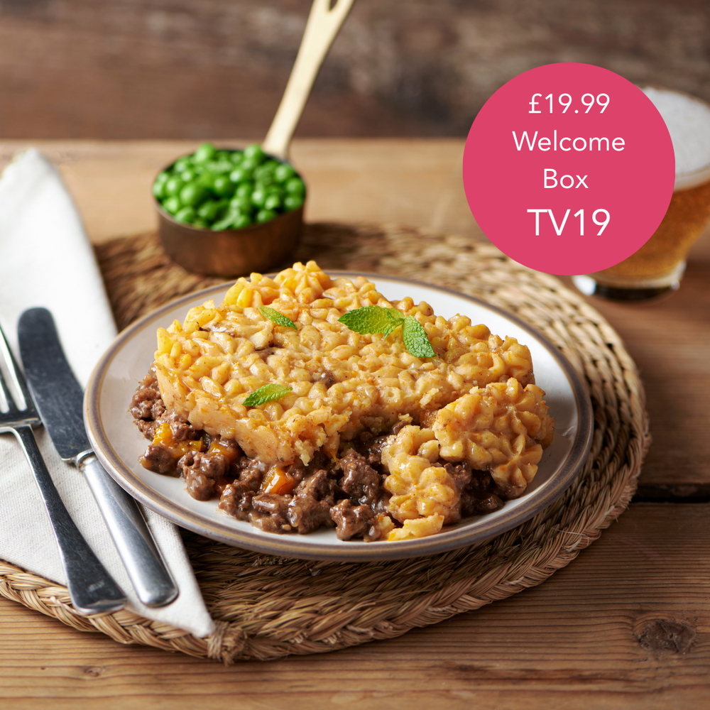 An image of Classic Chicken Dinner showing a piece of chicken with potatoes, carrots, parsnips and stuffing with gravy