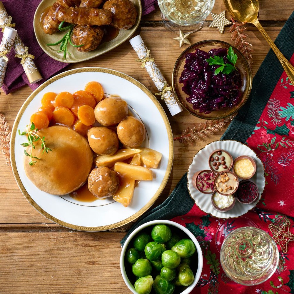 An Image a Classic Turkey Dinner on a table.